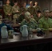 Commanders attend mission brief aboard USS Wasp