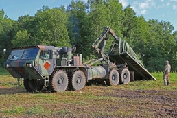 Soldiers Load LHS During Resupply