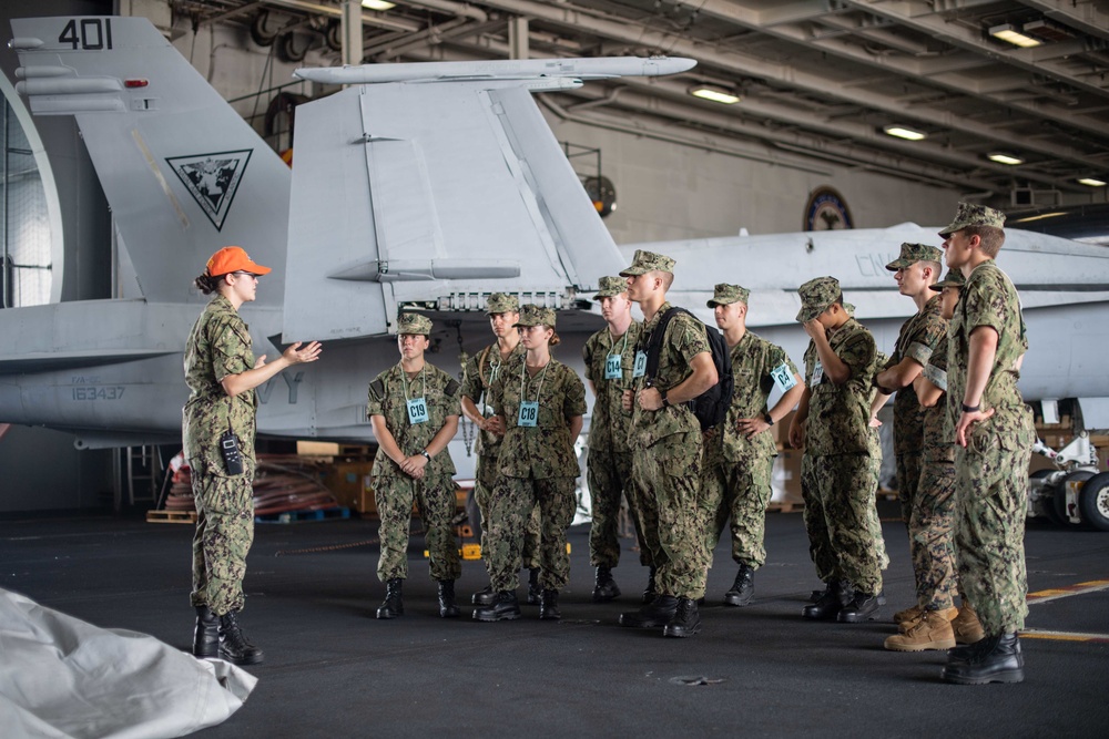 Midshipmen tour the aircraft carrier USS John C. Stennis (CVN 74)