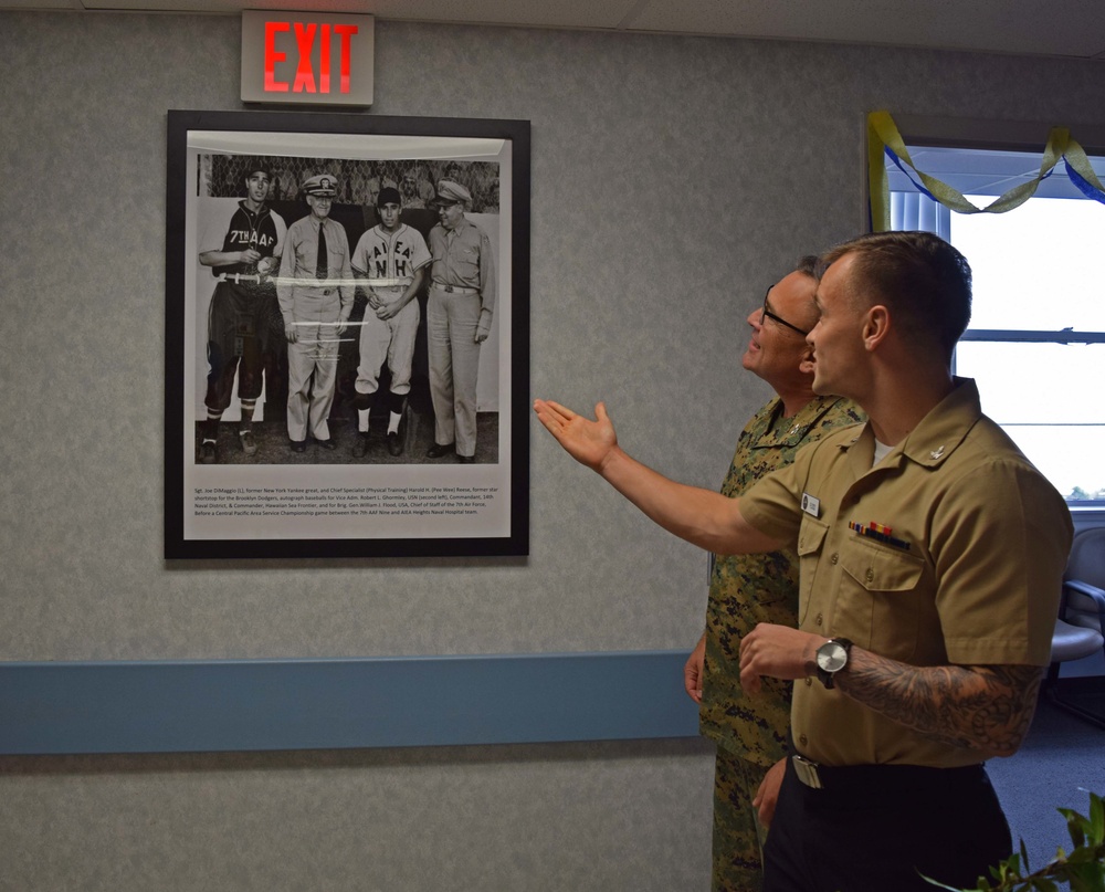 Petty Officer Third Class Flood Presents to Colonel Bango