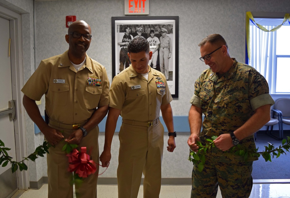 The ribbon is cut at the Camp Smith re-dedication