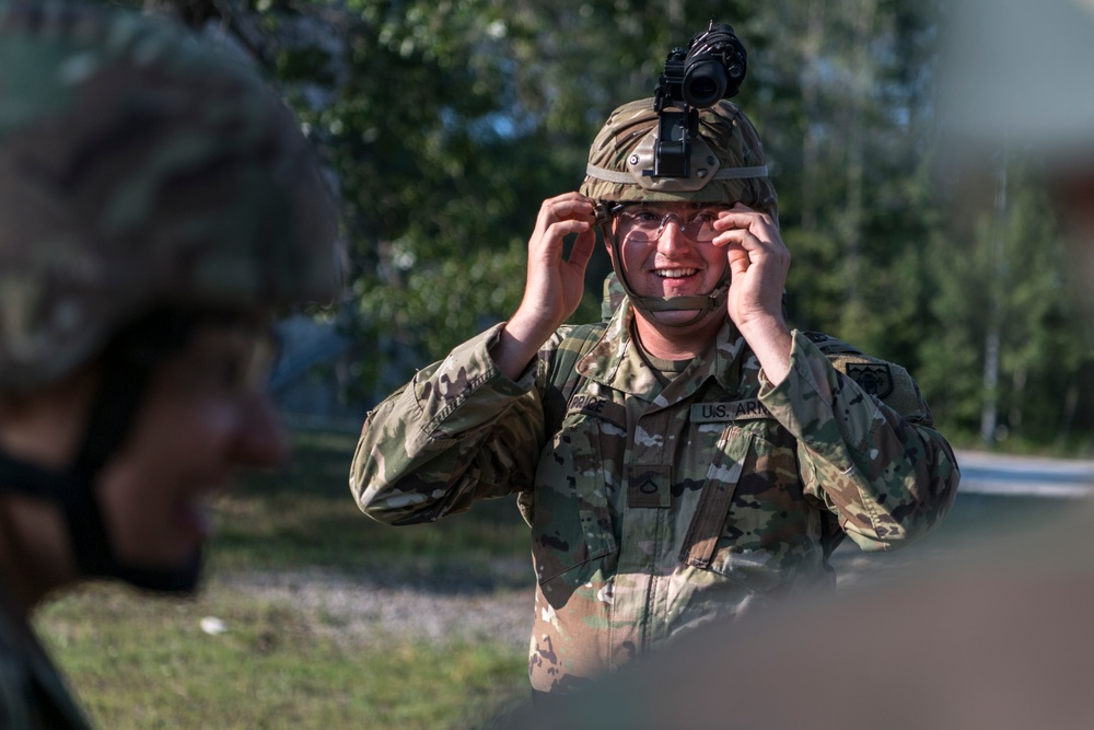 Pfc. Michael Price preparing for casualty training at Northern Strike 19