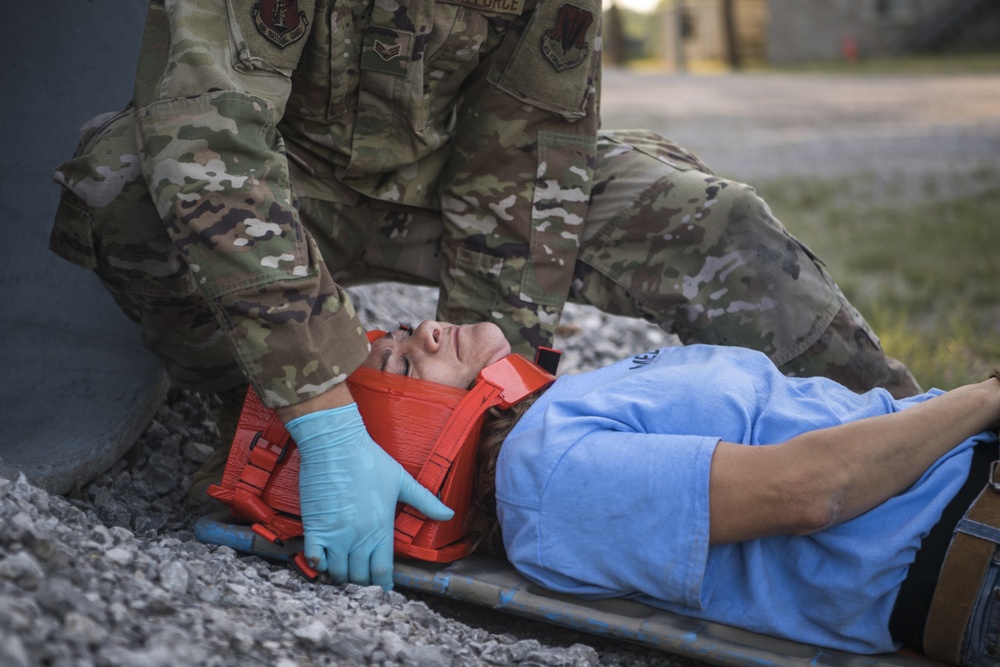 Joint Military Medical Team helping a casualty at Northern Strike 19