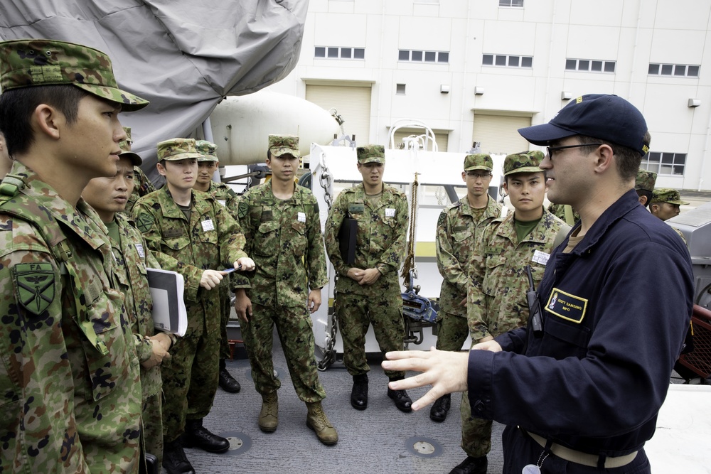 USS Pioneer Sailors Give A Ship Tour To Students Who Are Part Of Japan Self-Defense Forces