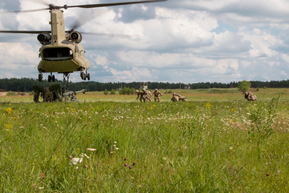 Soldiers Back Away From a Sling Load Operation