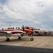 A line of T-44C Pegasus aircraft parked on the flightline aboard NAS Corpus Christi