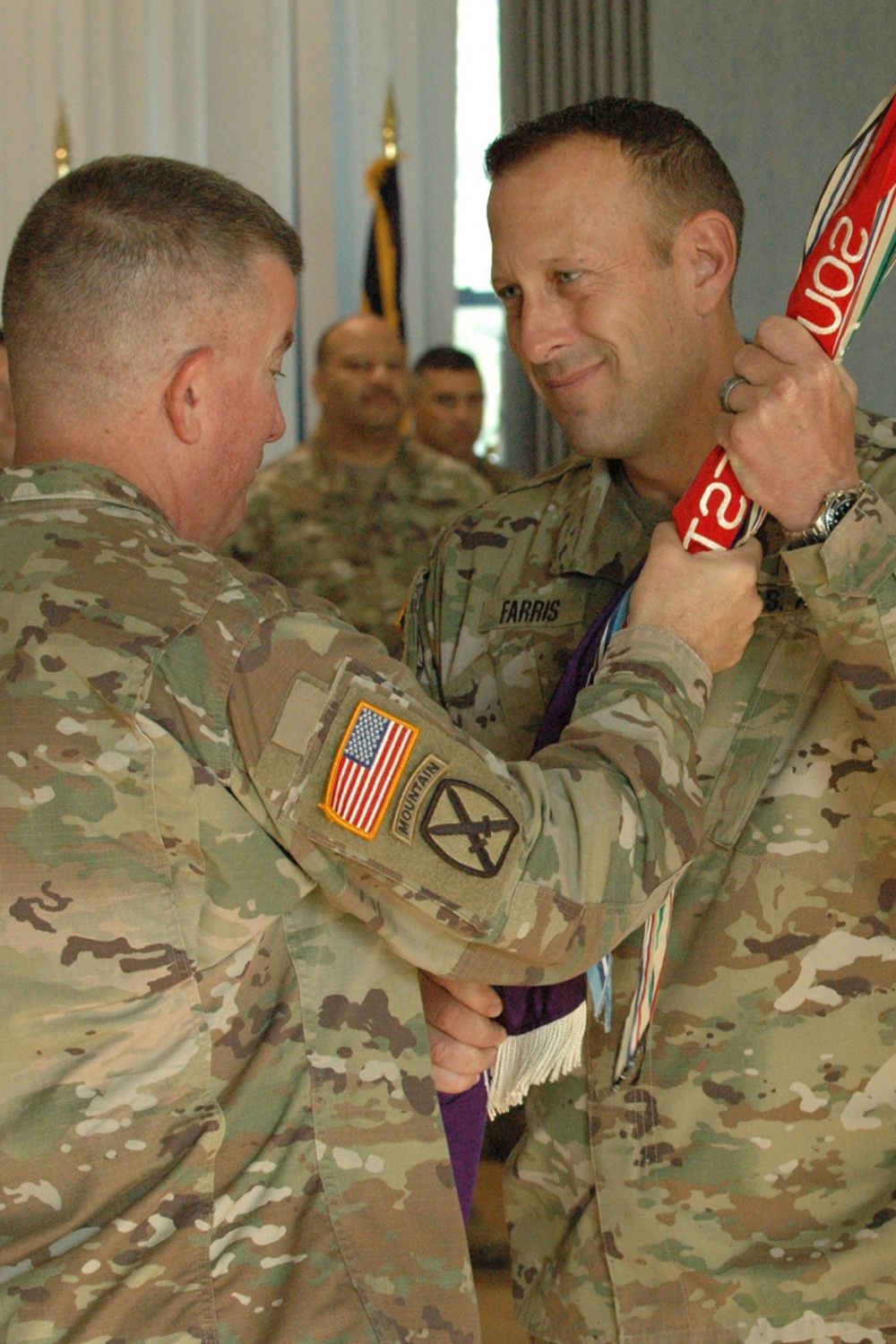 Brig. Gen. Jeffrey Farris accepts colors of 352nd Civil Affairs Commnand