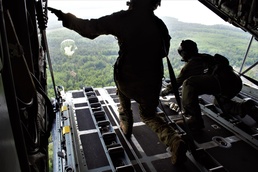 Peoria C-130 crew performs integrated air drop training during Northern Strike 19