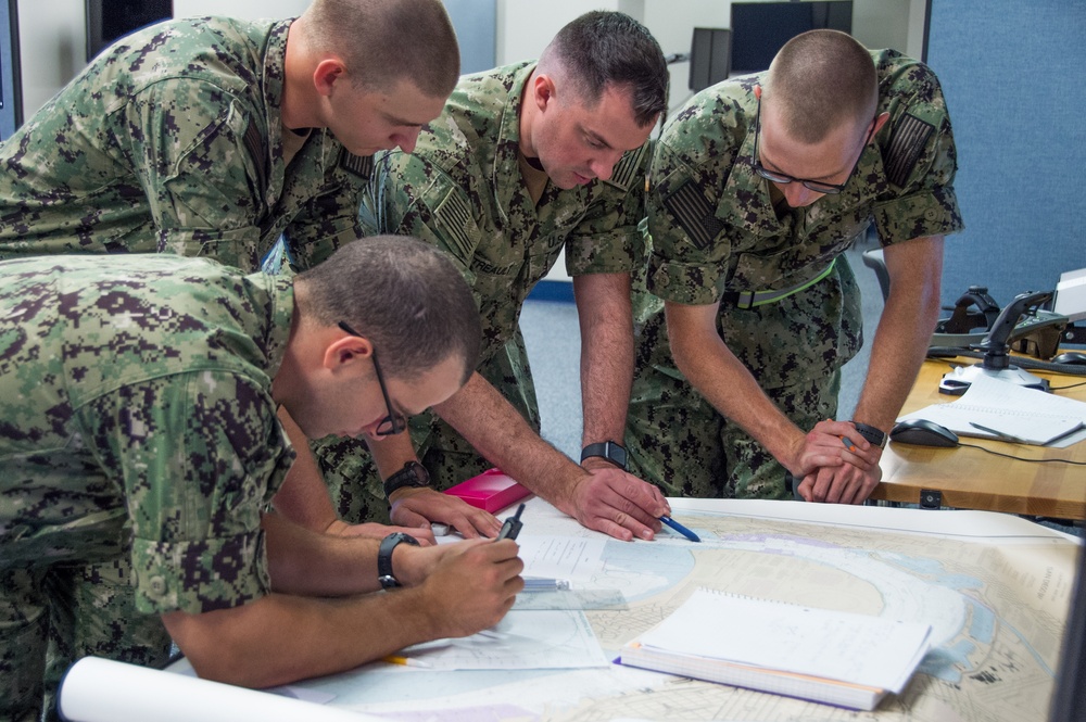NEWPORT, R.I. (July 25, 2019) – Officer Candidate School (OCS) class 16-19 candidates practice navigation skills as part of their professional education at Officer Training Command (OTCN) in Newport, Rhode Island on July 25, 2019.