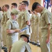NEWPORT, R.I. (July 25, 2019) – Students of Officer Development School (ODS) class 19-050 get their service khaki uniforms inspected at Officer Training Command, Newport on July 25, 2019.