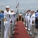 At attention during the National Anthem