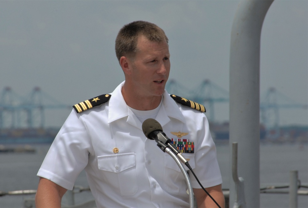 VFA-37 Commanding Officer speaks during a commissioning ceremony