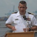 Former VFA-37 Commanding Officer speaks during a commissioning ceremony