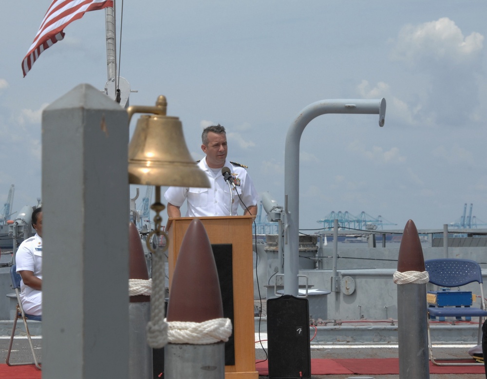 Former VFA-37 Commanding Officer speaks during a commissioning ceremony