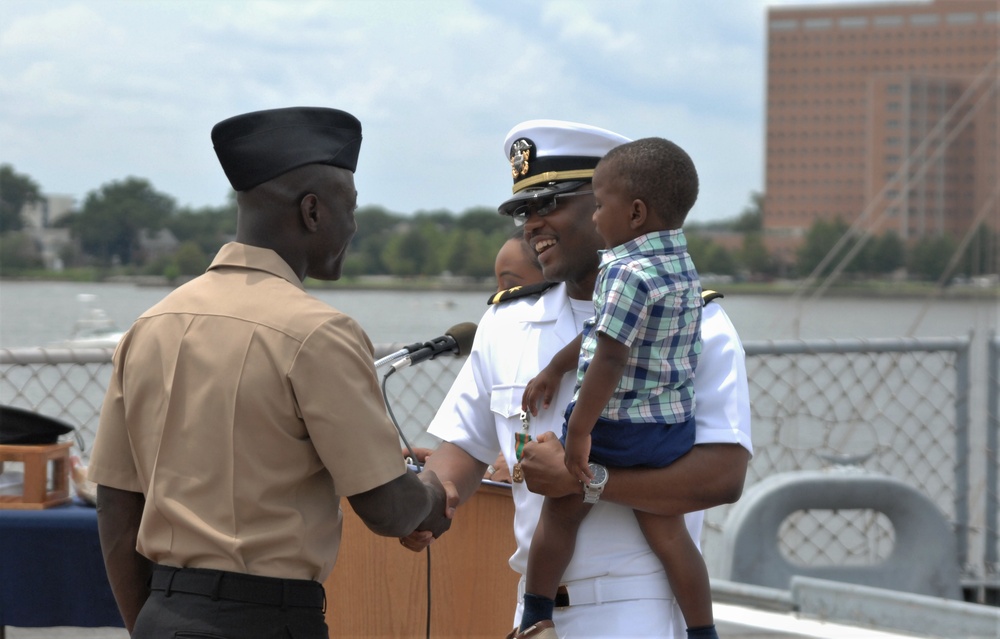 Handshake after a first salute