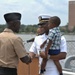 Handshake after a first salute