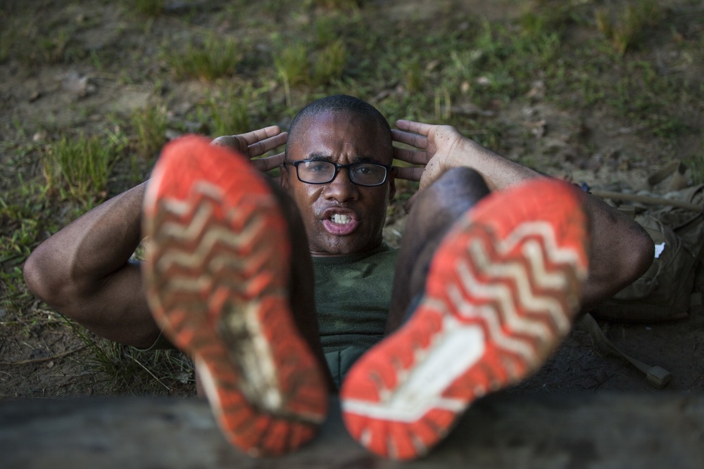 Marine Corps officer candidates run the Muscle Endurance Course