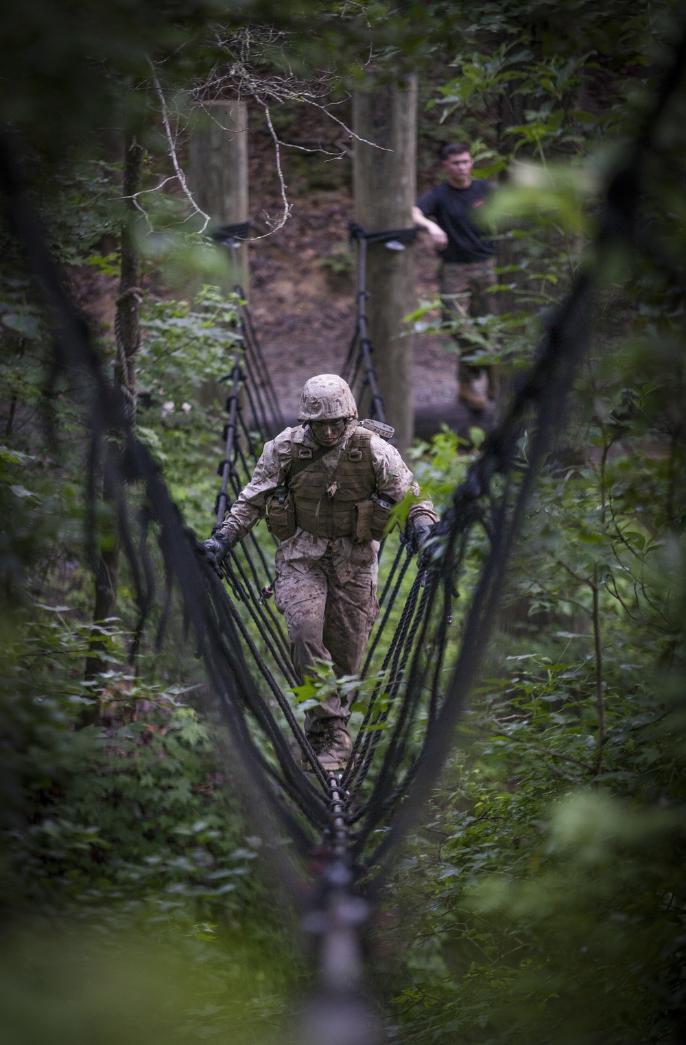Marine Corps officer candidates push through the Combat Course