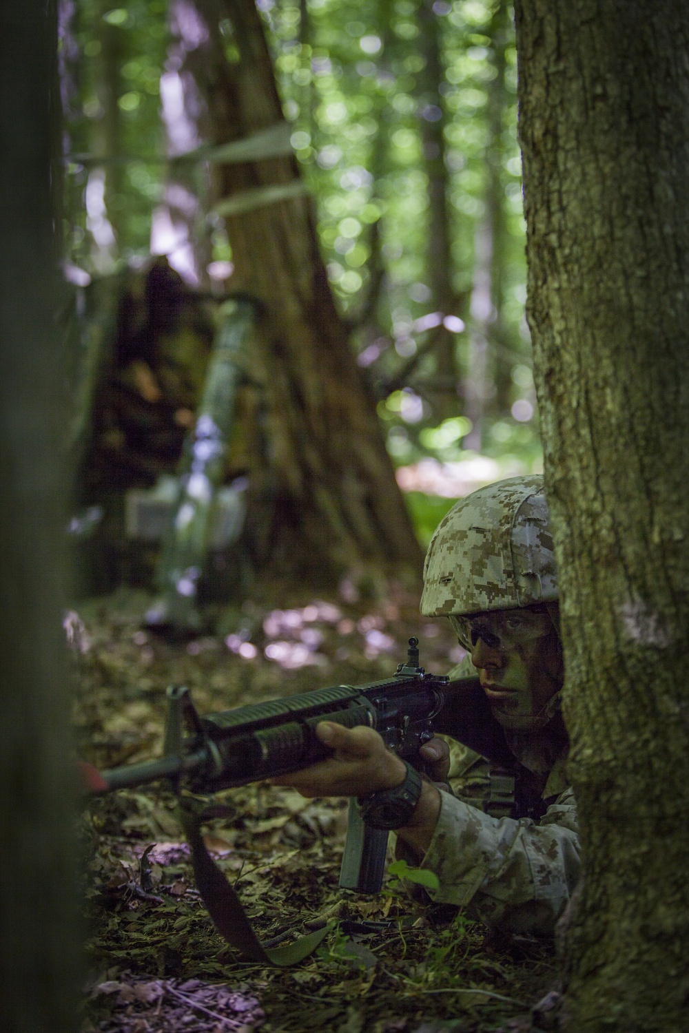 Marine Corps officer candidates test their leadership with the Small Unit Leadership Evaluation