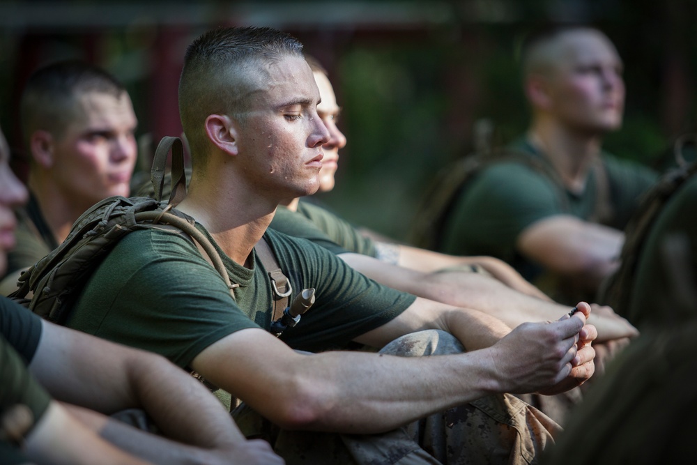 Marine Corps officer candidates earn their eagle, globe and anchor