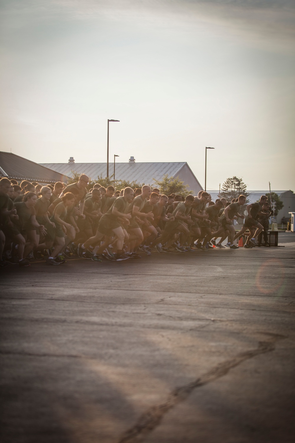 Marine Corps officer candidates run the Physical Fitness Test