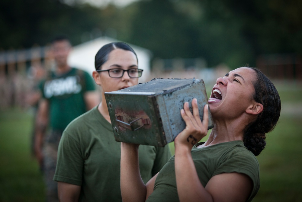 Marine Corps officer candidates run a Combat Fitness Test