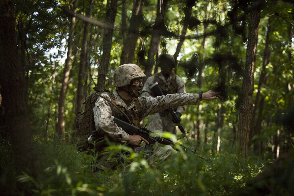 Marine Corps officer candidates test their leadership with the Small Unit Leadership Evaluation