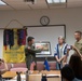 Commander of 152nd Airlift Wing presents award to local business for support