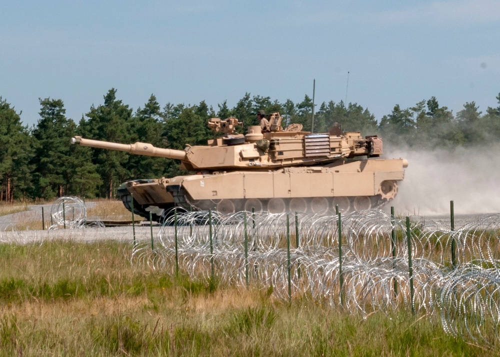 The 3rd Battalion 66th Armor Regiment and 1st Engineer Battalion of the 1st Armored Brigade Combat Team, 1st Infantry Division, conducted combined arms breach exercises