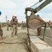 861st Engineers Place Concrete Barriers at Entry Control Point