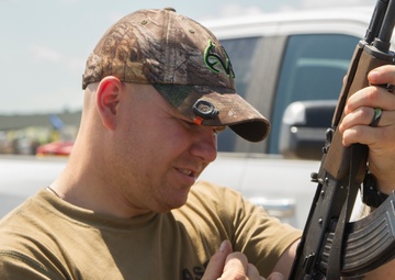 Sgt. Joshua Redkey charges an AK-47
