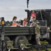 Children and Army trucks