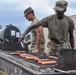 Army cooks working the grill