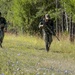 Spain team performs ruck march during the European Best Sniper Competition.