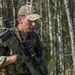 Cpl. Andres Nanez rucks through Grafenwoehr, Germany, representing Spain during the European Best Sniper Competition.