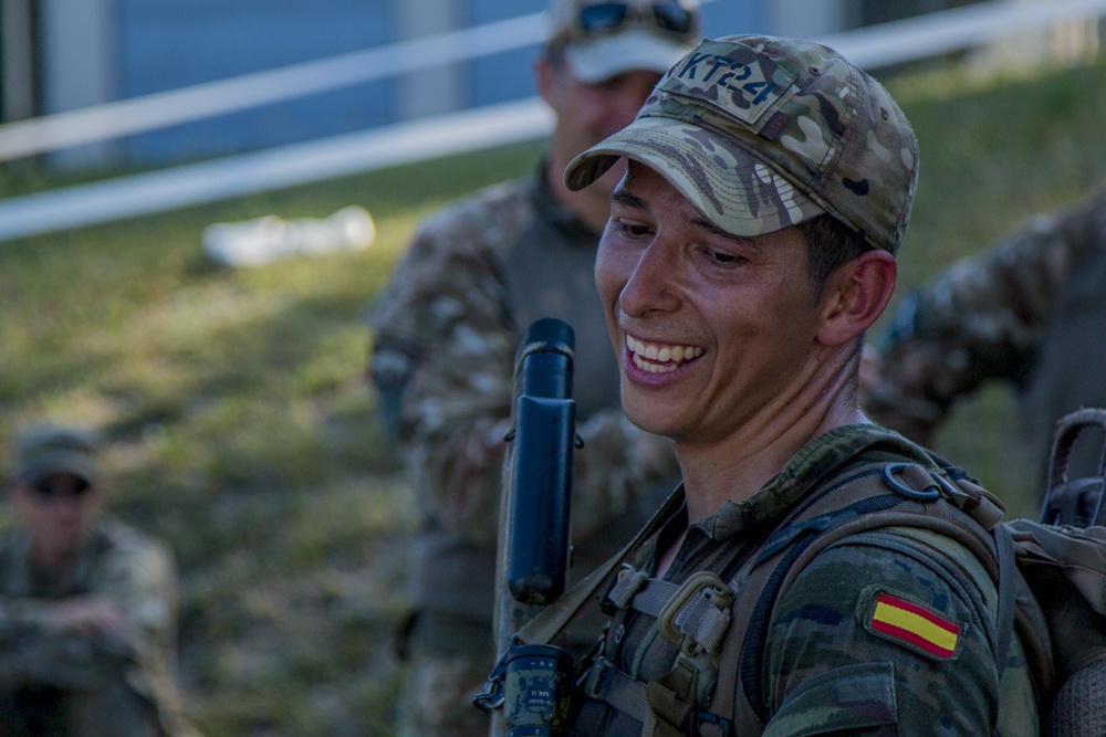Cpl. Andres Nanez completes the ruck march for the European Best Sniper Competition, Grafenwoehr, Germany, July 25, 2019.