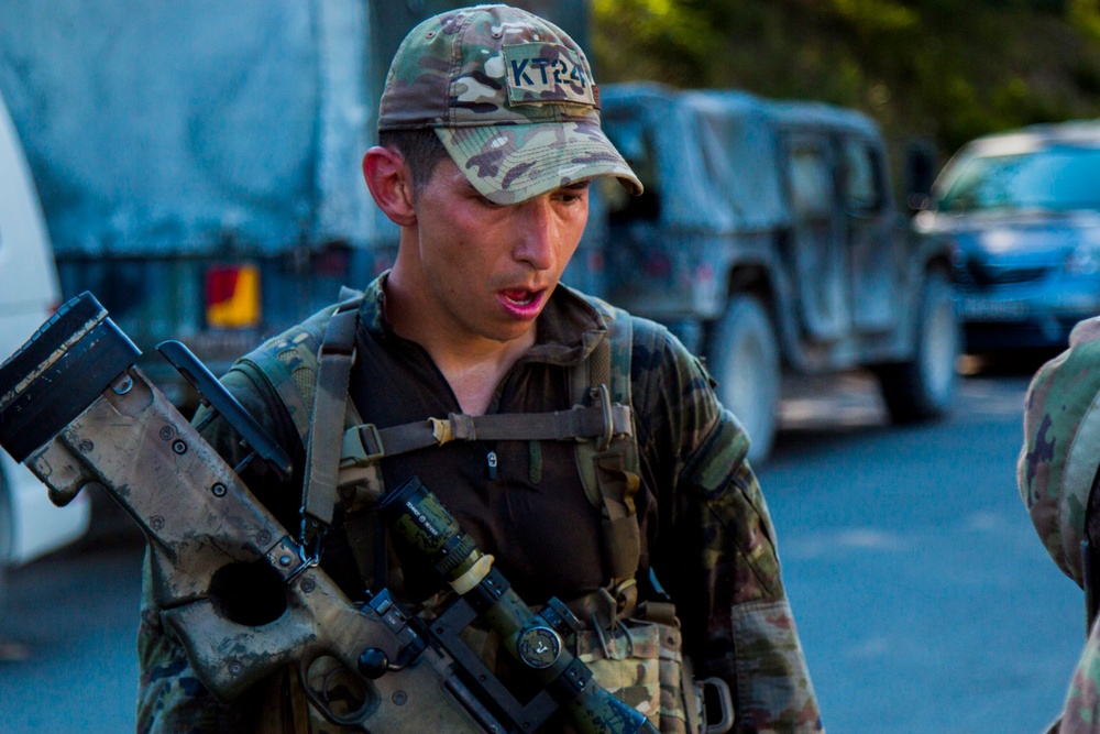 Cpl. Andres Nanez completes the ruck march for the European Best Sniper Competition, Grafenwoehr, Germany, July 25, 2019.