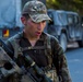 Cpl. Andres Nanez completes the ruck march for the European Best Sniper Competition, Grafenwoehr, Germany, July 25, 2019.