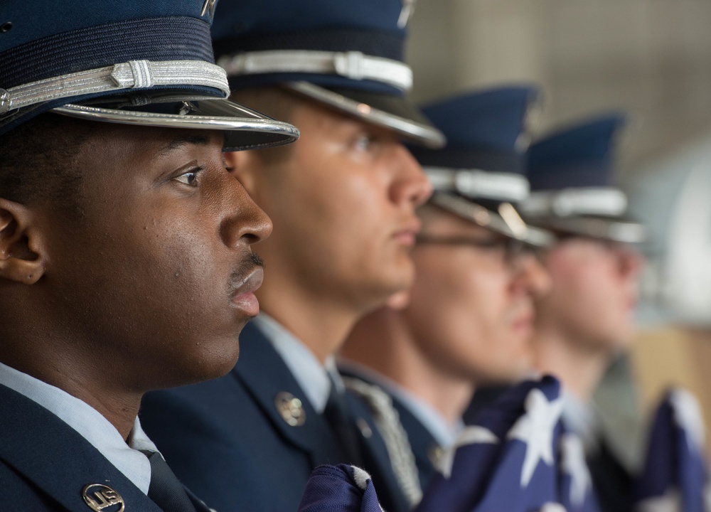 Whiteman AFB Honor Guardsmen stand ready to present flags during ceremony practice