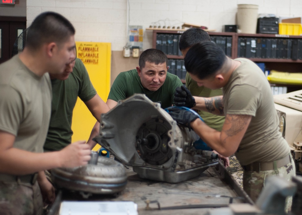 AZ Guard, Kazakh Service Members keep partnership rolling during vehicle maintenance exchange