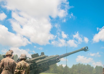 13B Instructor observes firing team of students