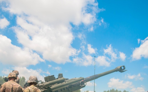 13B Instructor observes firing team of students
