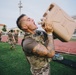 U.S. Army paratrooper hydrates during physical fitness event