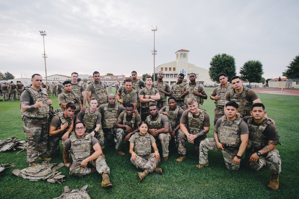 U.S. Army paratroopers pose after competing in physical fitness event