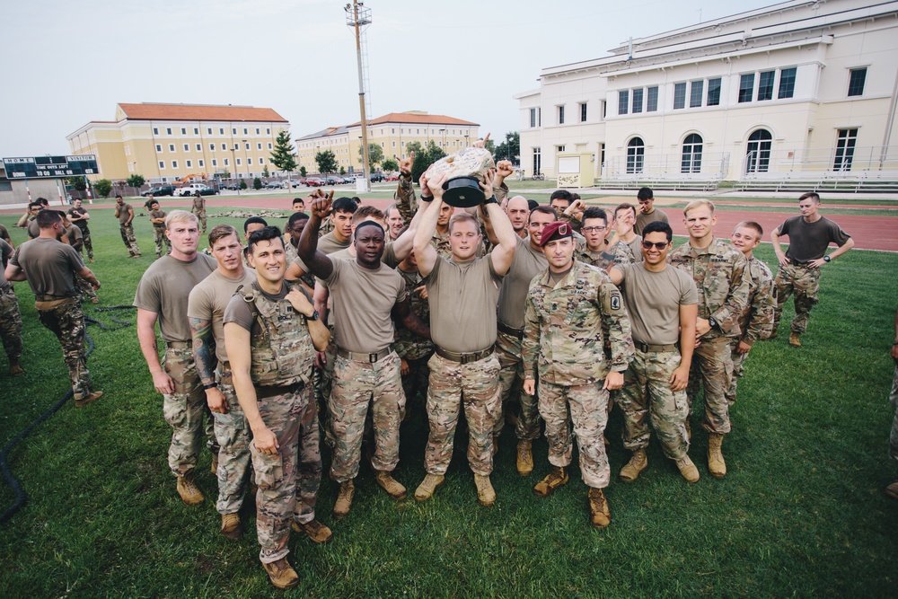 U.S. Army paratroopers hold trophy after competing in physical fitness event