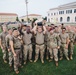 U.S. Army paratroopers hold trophy after competing in physical fitness event