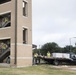 Professionals from the 502d Air Base Wing Civil Engineer Group work to remediate dorms with mold