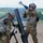 Infantryman loads mortar tube at XCTC