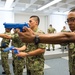 Officer Candidate School (OCS) class 15-19 candidates practice safe weapons handling at Officer Training Command (OTCN) in Newport, Rhode Island on July 30, 2019.