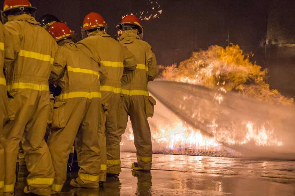 Officer Development School (ODS) class 19-050 here at Officer Training Command, Newport, Rhode Island, conduct shipboard firefighting training July 30, 2019.